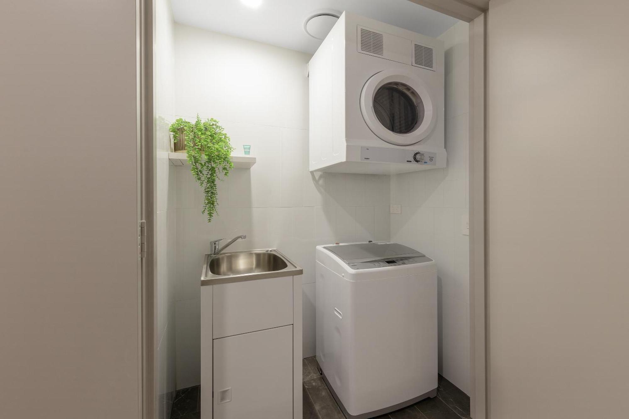 Meriton Suites North Ryde Sídney Exterior foto Laundry room